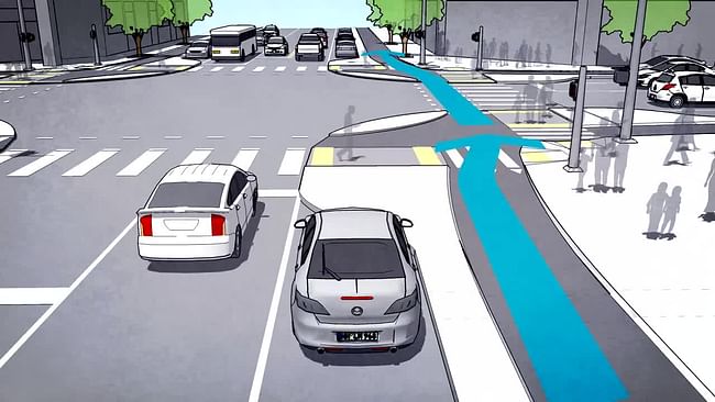 Dutch model of a protected intersection, which allows for the easy flow of bicyclists, pedestrians, and cars (image via Wikipedia).