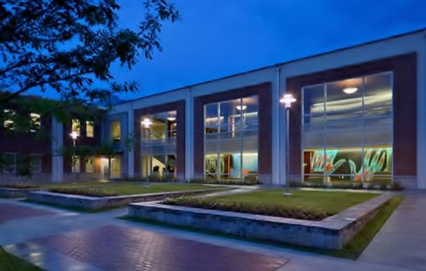 Dusk view of the Health Sciences Building from courtyard.