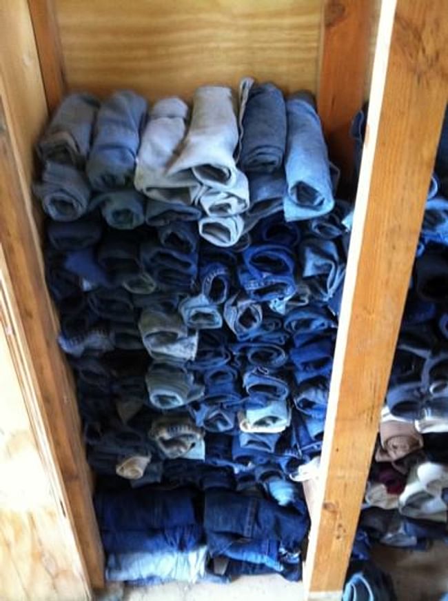 Two tons of waste denim jean legs & arms were used for wall insulation. Photo courtesy of Duncan Baker-Brown