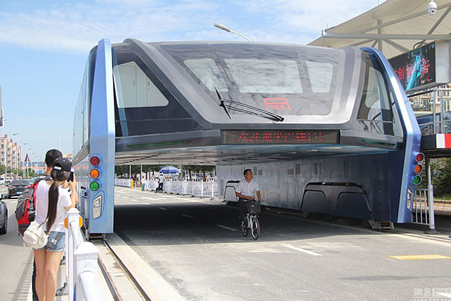 Presented as the public transit future back in August, the Transit Explore Bus has since been left abandoned on a public road in Qinhuangdao. (Image via shanghaiist.com)