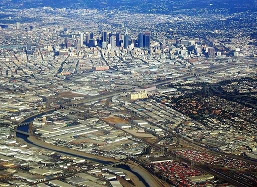 The Los Angeles River (separating East LA and Downtown in this photo) should see more housing development along its banks, advocates a new report from the Los Angeles Business Council. (Image via Wikipedia)
