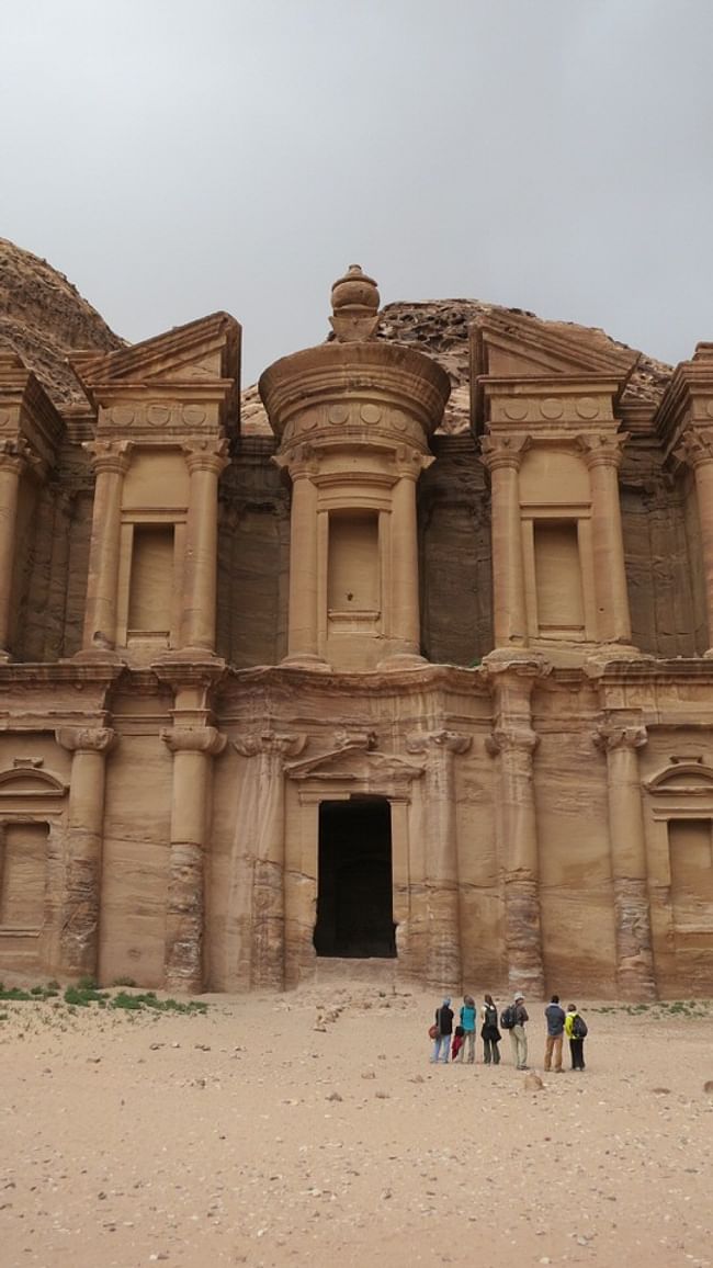 The scanning team looking up at the Monastery, the largest monument at Petra, Jordan. Courtesy of Emma Pound/Atlantic Productions