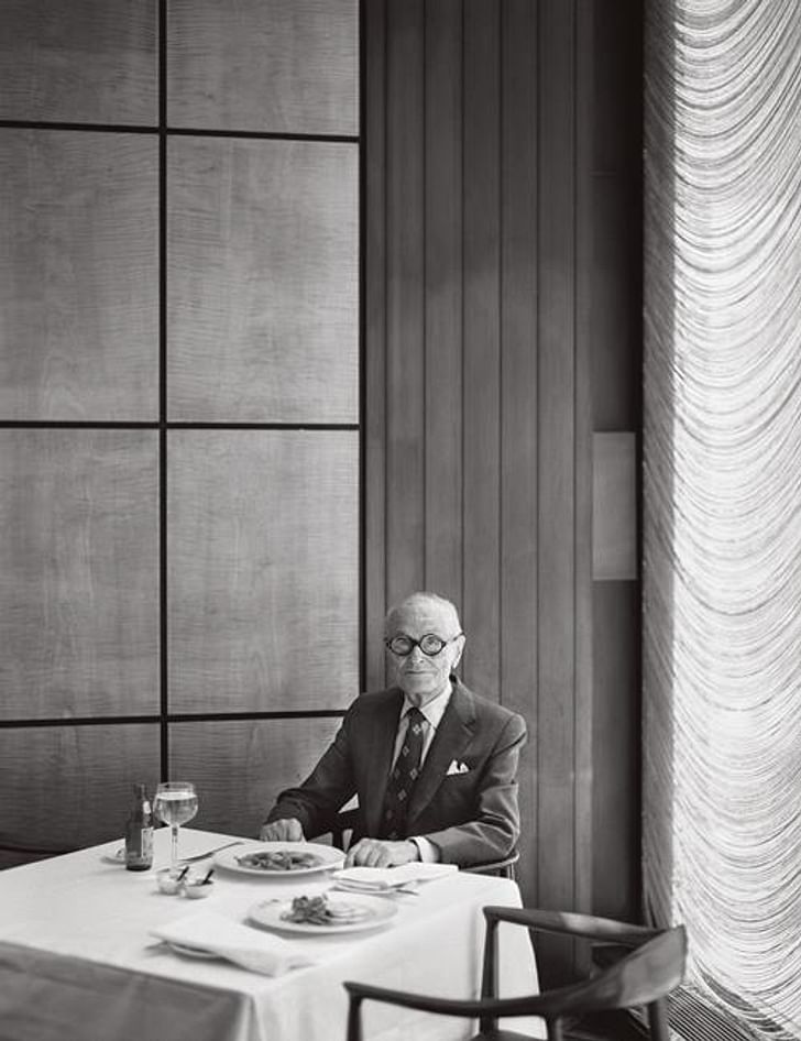 Philip Johnson at a corner table in the Grill Room, Seagram Building, New York. Courtesy of Dirty Furniture.