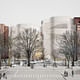 The view of the exterior façade of the Gilder Center from 79th Street and Columbus Avenue, including street trees and park plantings, as it would appear at opening. Courtesy of Studio Gang Architects 