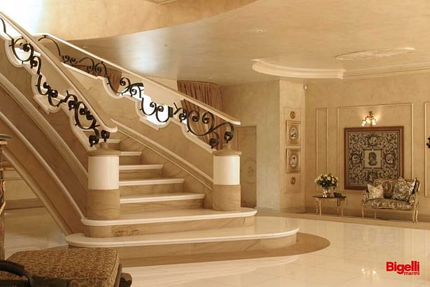 Staircase in Pietra Dorata honed and Bianco Thassos polished.