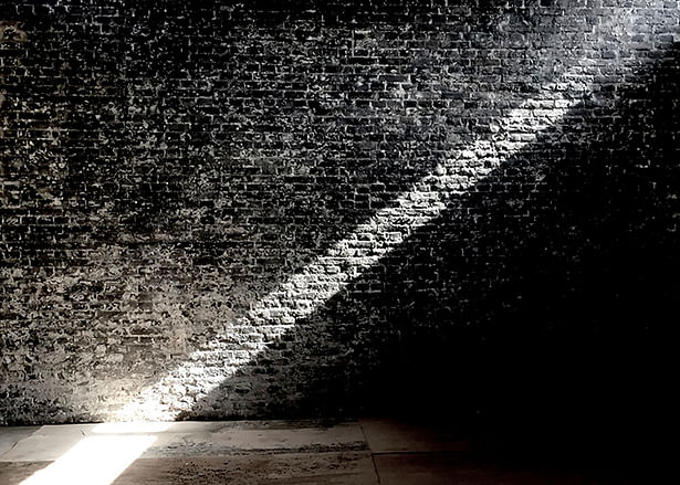 light effect on the exposed brick wall