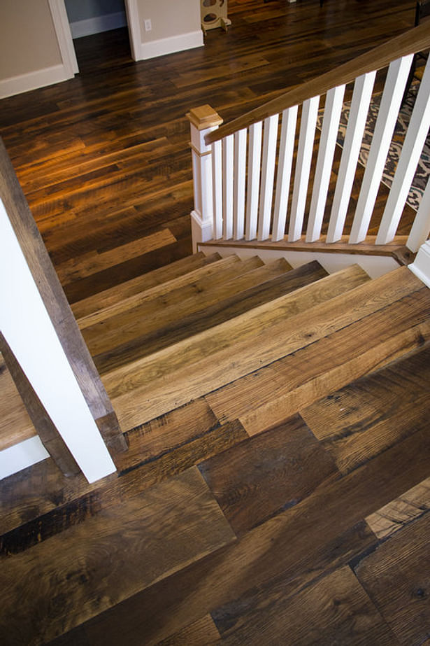 Heartland Barnwood Skip Planed Flooring in Lexington, Kentucky. Visit https://www.oldworldtimber.com/.